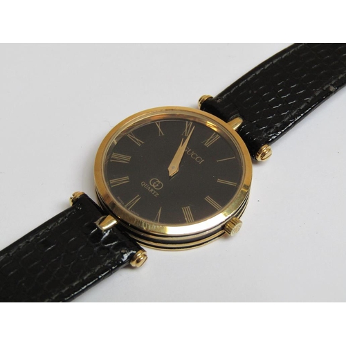 1256 - GUCCI GENTS WATCH WITH LEATHER STRAP