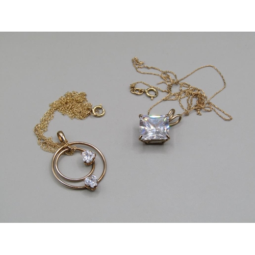 1267 - TWO PENDANTS - GOLD MOUNTED AND GOLD CHAINS