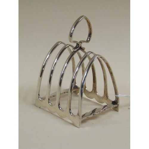 1350 - TWO SILVER TOAST RACKS , ONE WITH A SWAN HEAD TERMINAL 5.6oz