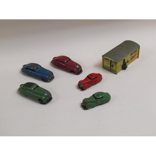 1410 - COLLECTION OF 1930s SCHUCO MOTOR VEHICLES INC. FIVE SALOONS AND A SCHUCO GARAGE