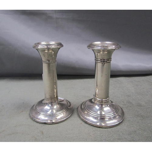 1462 - PAIR OF SILVER FILLED CANDLESTICKS