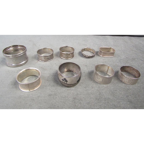 1466 - COLLECTION OF EIGHT SILVER NAPKIN RINGS