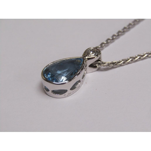 1328B - WHITE GOLD AQUAMARINE AND DIAMOND SET PENDANT ON A 9ct WHITE GOLD CHAIN