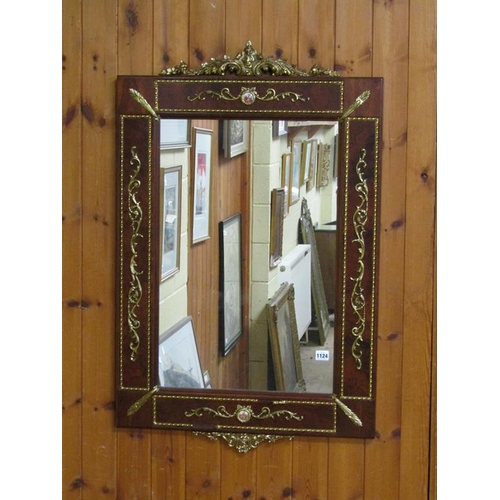 1124 - MAHOGANY FINISHED WALL MIRROR WITH GILT MOTIFS AND CREST, 100CM X 64CM