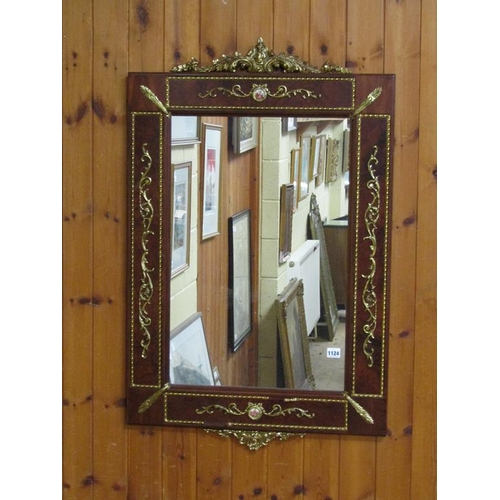 1124 - MAHOGANY FINISHED WALL MIRROR WITH GILT MOTIFS AND CREST, 100CM X 64CM