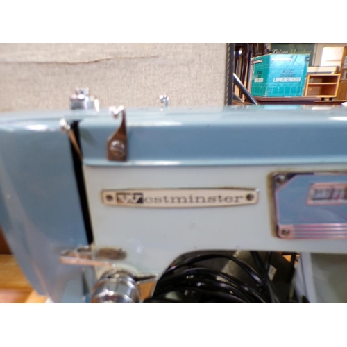 608 - VINTAGE SEWING MACHINE