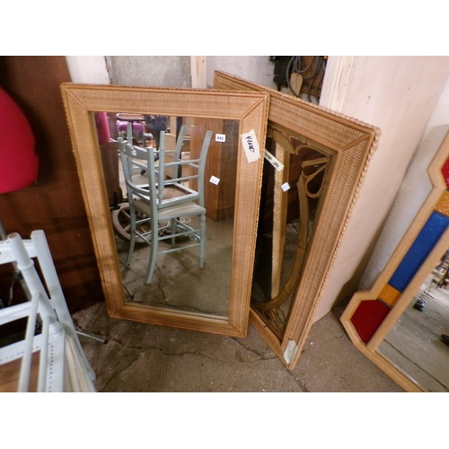 692 - TWO WICKER FRAMED MIRRORS