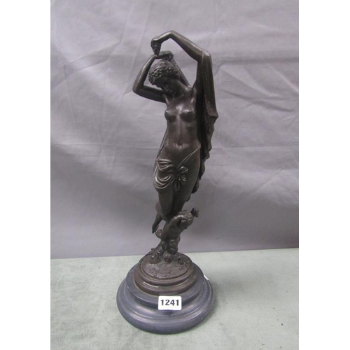 1241 - PATINATED BRONZED METAL FIGURE GROUP OF A CLASSICAL NAKED FEMALE AND A PUTTI FIGURE ON CIRCULAR BASE... 