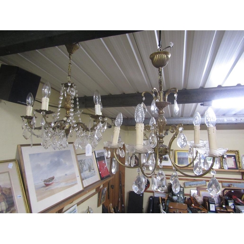 1195 - TWO GILT METAL CHANDELIERS, EACH FIVE BRANCH WITH CUT GLASS DROPLETS