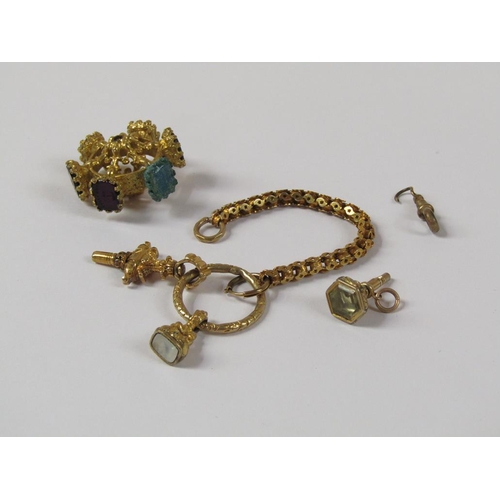 1516 - GOLD WATCH CHAIN WITH CIRCLE WATCH WINDER AND FOB TOGETHER WITH ONE LOOSE FOB AND A RUNNING WHEEL ST... 