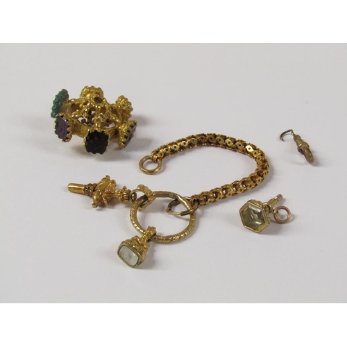 1516 - GOLD WATCH CHAIN WITH CIRCLE WATCH WINDER AND FOB TOGETHER WITH ONE LOOSE FOB AND A RUNNING WHEEL ST... 