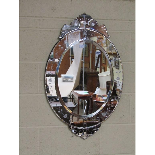 1174 - WALL MIRROR OF OVAL FORM ENGRAVED WITH FLORAL SPRAYS, 88CM X 56CM