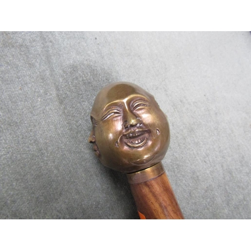 1349 - WALKING STICK WITH FOUR FACES OF BUDDAH HANDLE, 95CM L