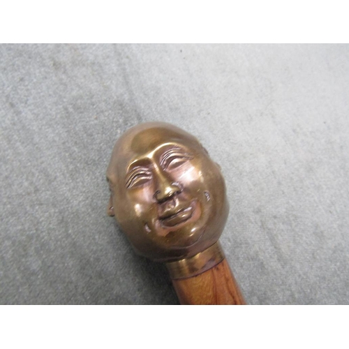 1349 - WALKING STICK WITH FOUR FACES OF BUDDAH HANDLE, 95CM L