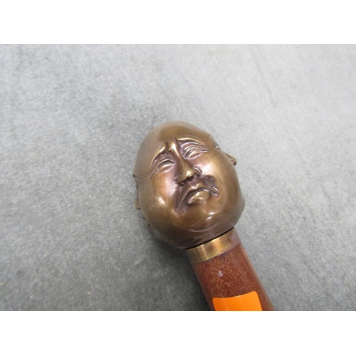 1349 - WALKING STICK WITH FOUR FACES OF BUDDAH HANDLE, 95CM L