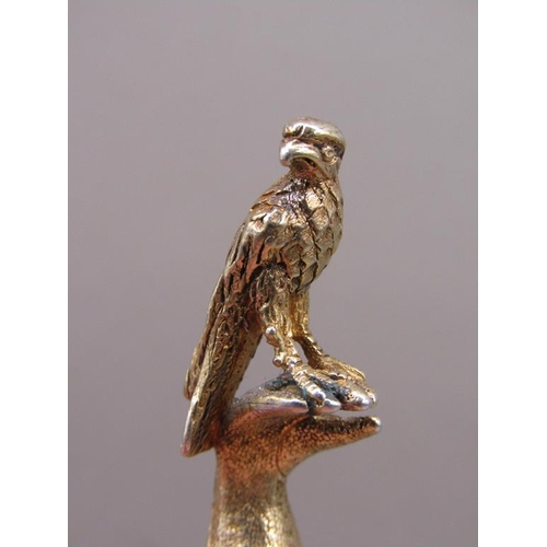 1545 - SILVER GILT HAWK AND GLOVE SEAL, 5CM L