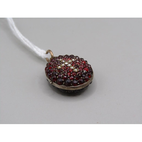 1575 - GOLD RUBY AND SEED PEARL SET LOCKET