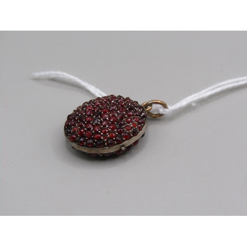 1575 - GOLD RUBY AND SEED PEARL SET LOCKET