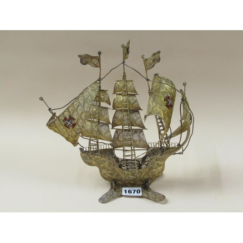 1670 - FILIGREE GILT METAL MODEL OF A SAILING VESSEL, 26cms H