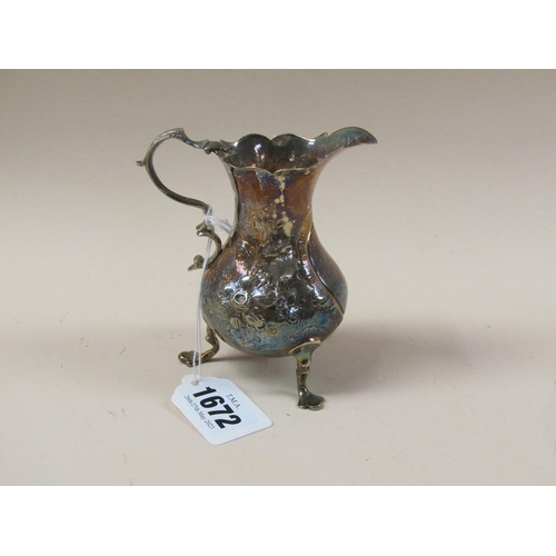 1672 - LATE GEORGIAN SILVER CREAM JUG WITH EMBOSSED AND CHASED DECORATION