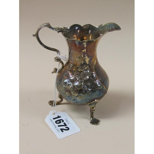 1672 - LATE GEORGIAN SILVER CREAM JUG WITH EMBOSSED AND CHASED DECORATION