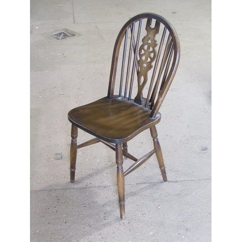 607 - FOUR WHEELBACK DINING CHAIRS