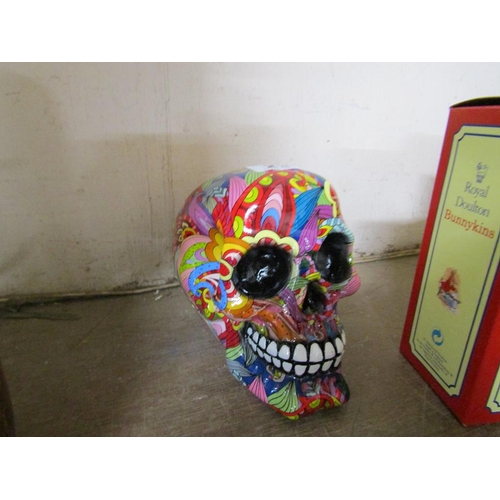 23 - DECORATIVE MODEL OF A SKULL