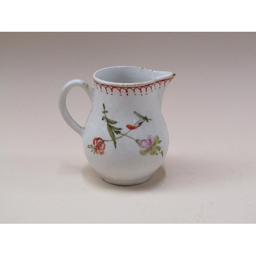 174 - An 18c English creamware sparrow beak jug, hand painted floral decoration, a/f, 8cm h.