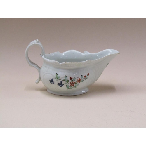 178 - An 18c Moulded cream jug, hand painted with flowers, 6cm h.