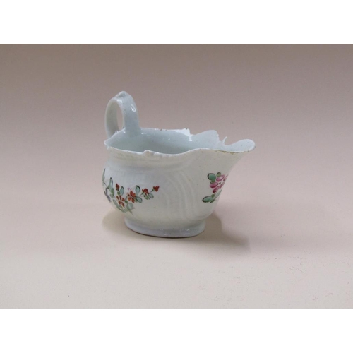 178 - An 18c Moulded cream jug, hand painted with flowers, 6cm h.