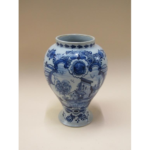 179 - A 19c Delft blue and white vase of baluster form, 22cm h.