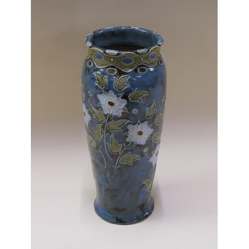 199 - A large Doulton Lambeth stoneware vase of baluster form with floral tube line decoration on a blue m... 