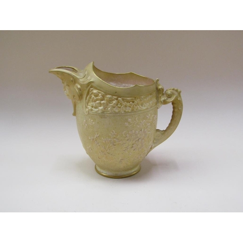 202 - A Doulton Burslem for Tiffany & Co relief moulded ivory jug, 17cm h.