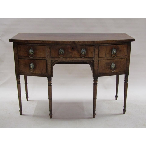 271 - A late Georgian figure mahogany bow front sideboard, crossbanded and line inlaid, having one short d... 