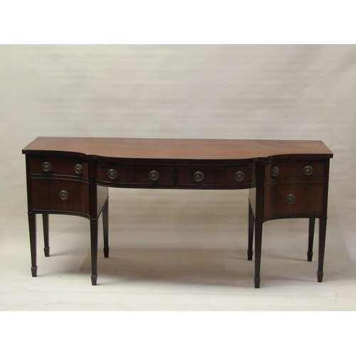 276 - An early 20c mahogany bow front sideboard with ebony line inlay, having two frieze drawers flanked b... 