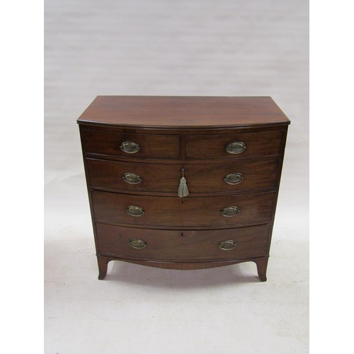 277 - An early 19c mahogany bow front chest of two short and three long graduated drawers on splayed brack... 