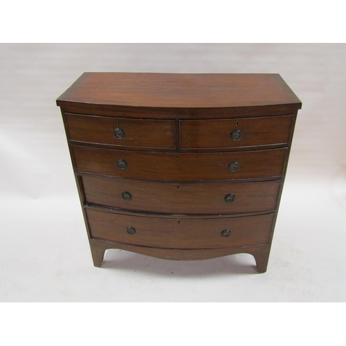 281 - An early 19c mahogany bow front chest of two short and three long graduated drawers on bracket feet,... 