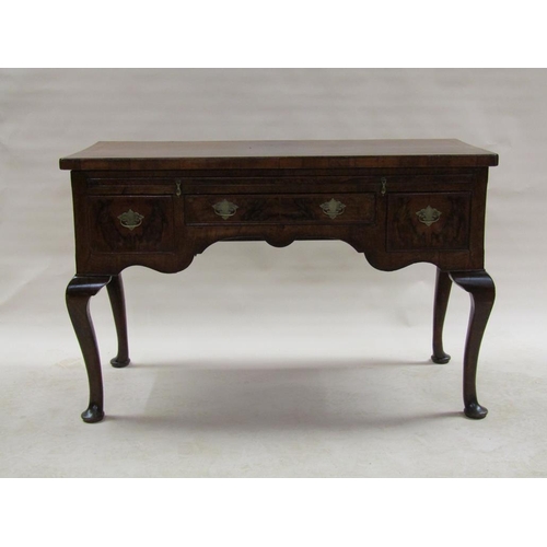 283 - A late 18c figured walnut veneered side table of rectangular form, cross banded and chequer line inl... 