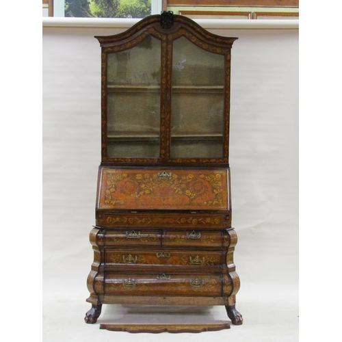 284 - An 18c Dutch style marquetry bureau bookcase, profusely decorated with leaf and flowers, having one ... 