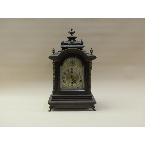 29 - A late 19c German bracket clock by Kienzle, the three train barrelled spring movement chiming on fou... 