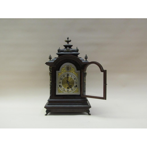 29 - A late 19c German bracket clock by Kienzle, the three train barrelled spring movement chiming on fou... 