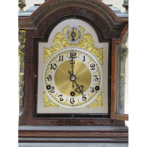 29 - A late 19c German bracket clock by Kienzle, the three train barrelled spring movement chiming on fou... 