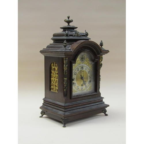 29 - A late 19c German bracket clock by Kienzle, the three train barrelled spring movement chiming on fou... 