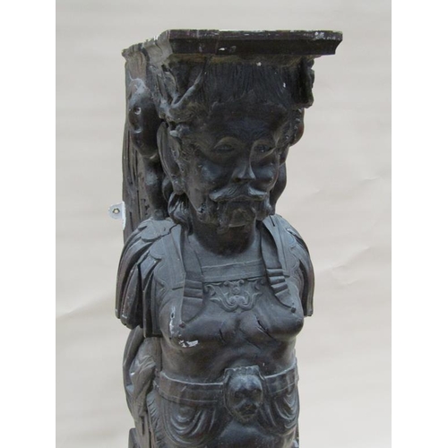 293 - A 19c oak buttress bracket carved as a Bacchanalian gentleman with horns and wings, 27cm w, 118cm h.