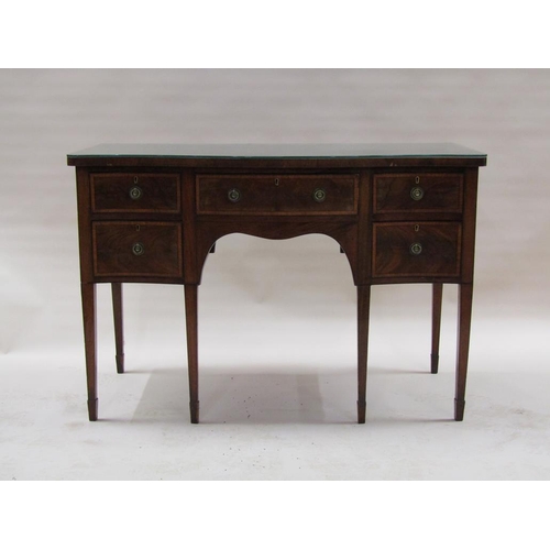 294 - An early 19c mahogany side table of serpentine form, the top crossbanded over one long central drawe... 