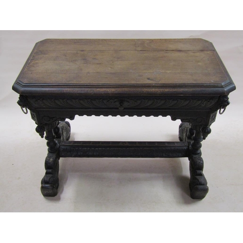 305 - A 19c oak refectory table of rectangular form with cut off corners and moulded edge, having one long... 