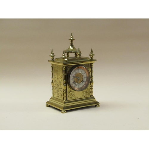 31 - A late 19c French mantel clock, the movement rack striking on a gong.  It is contained in a brass ca... 