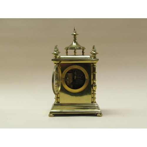 31 - A late 19c French mantel clock, the movement rack striking on a gong.  It is contained in a brass ca... 