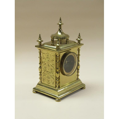 31 - A late 19c French mantel clock, the movement rack striking on a gong.  It is contained in a brass ca... 