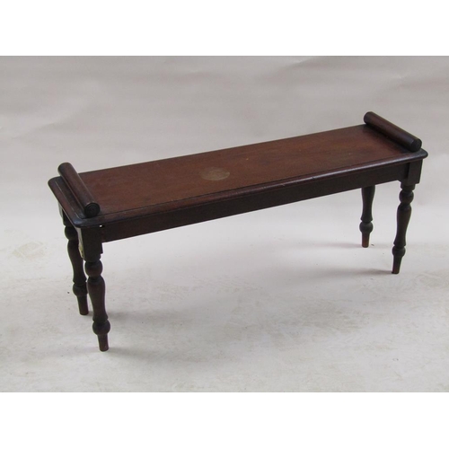 313 - A Victorian mahogany roll end bench supported on baluster ring turned legs, 102cm w, 44cm h.